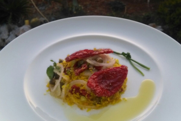 Friscous con pomodoro secco rucola e pinoli